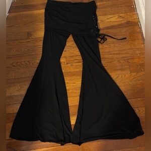 Darker Wavs Black Flared Stretchy Pants With Mini Skirt Attached From Dolls Kill